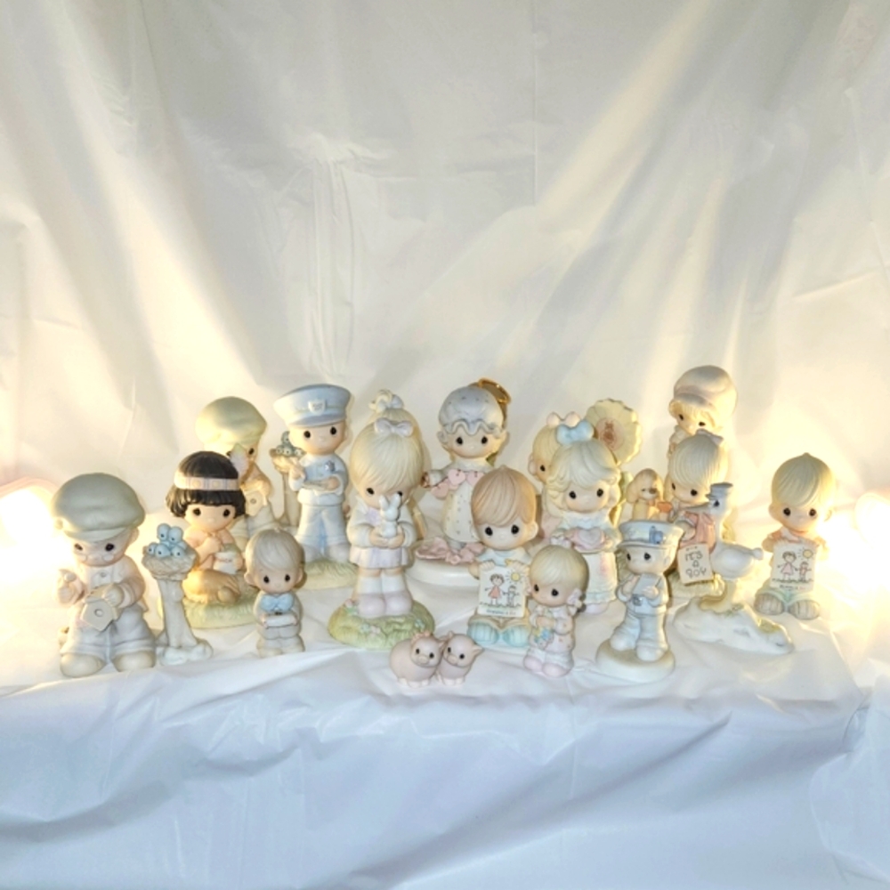 15 Enesco Precious Moments Figurines